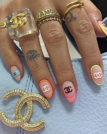 Designer logo nail manicure