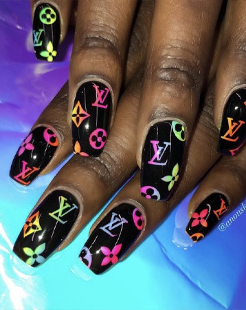 Designer logo nail manicure
