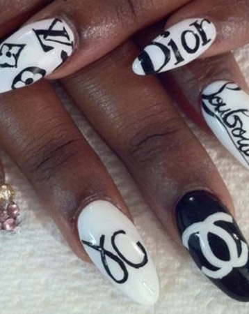Designer logo nail manicure
