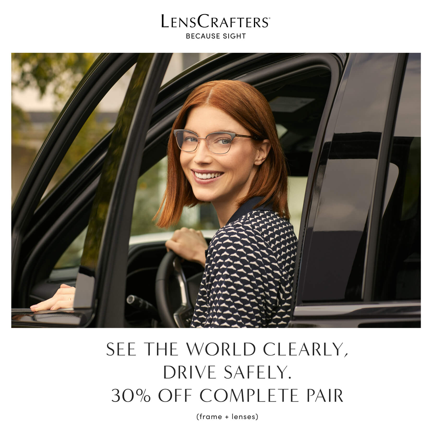 Smiling woman wearing glasses stepping into her car