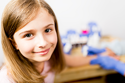 Young girl at school free from allergy symptoms.