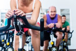 Graphicstock Group Senior And Young People In Spinning Course On Fitness Bike In Gym Doing Endurance And Cardio Training The Instructor Is Leading Them On BPXgGMsDpg Thumb
