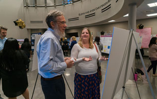 teachers-looking-at-posters