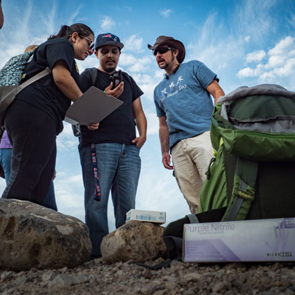 students-doing-experiements-outside