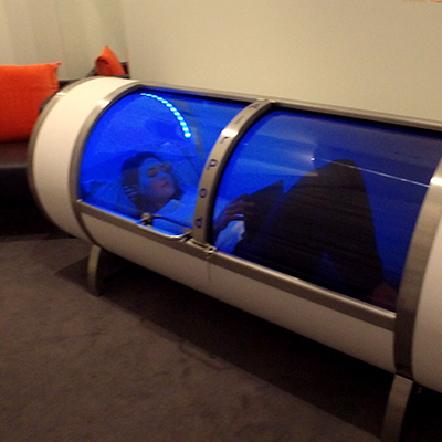 Photo of girl in airpod during session