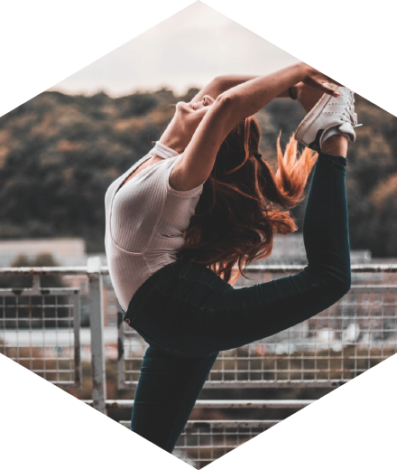 girl performing gymnastics outdoors