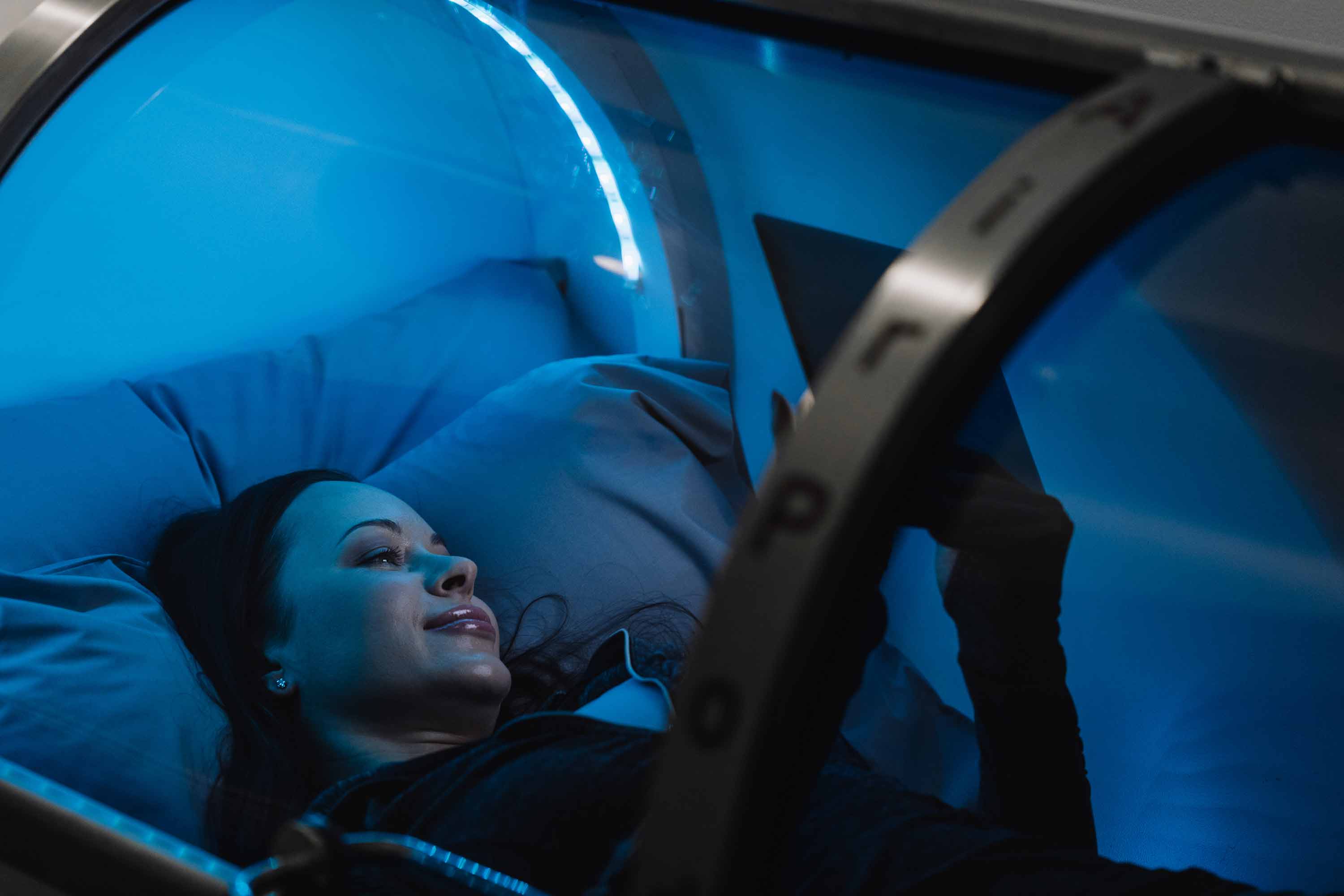 girl in AirPod using iPad