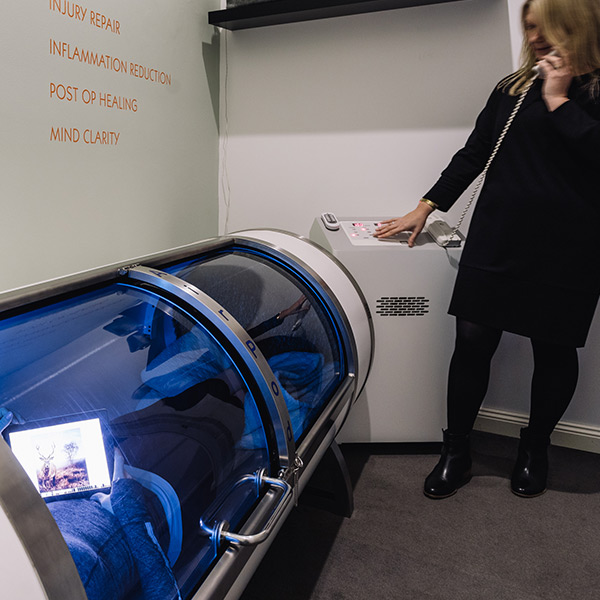 Girl enjoying session in AirPod Capsule.