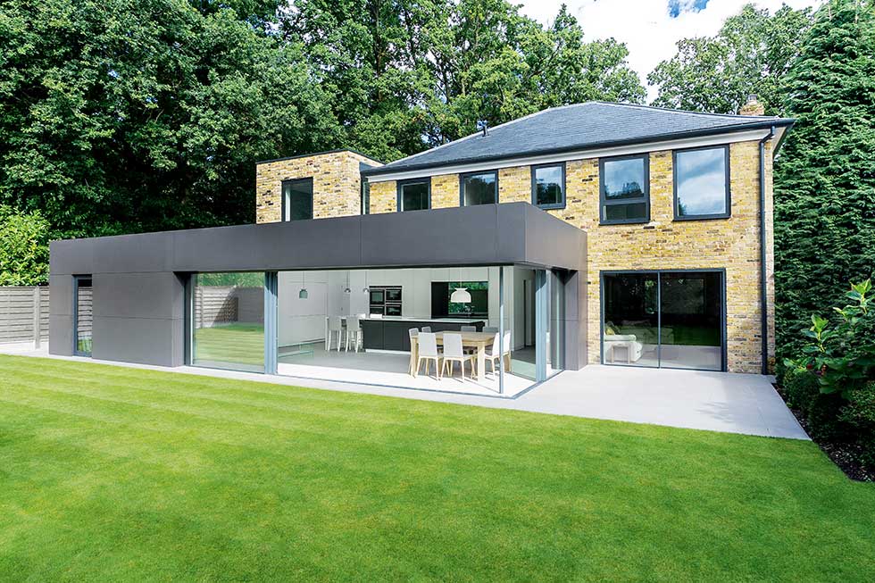 modern extension to brick clad house