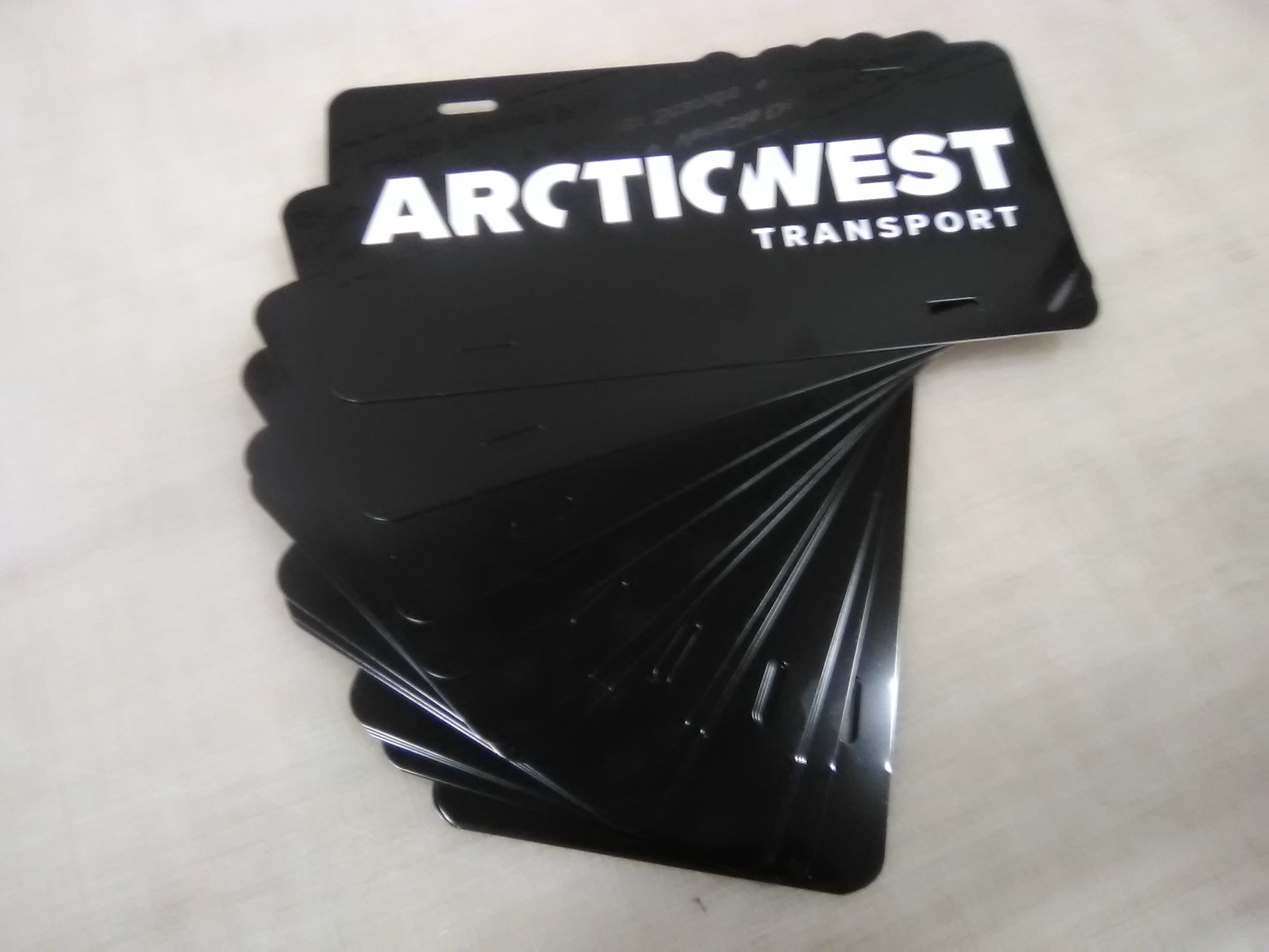 Custom branded fleet decals and fleet numbers for Arcticwest Transport