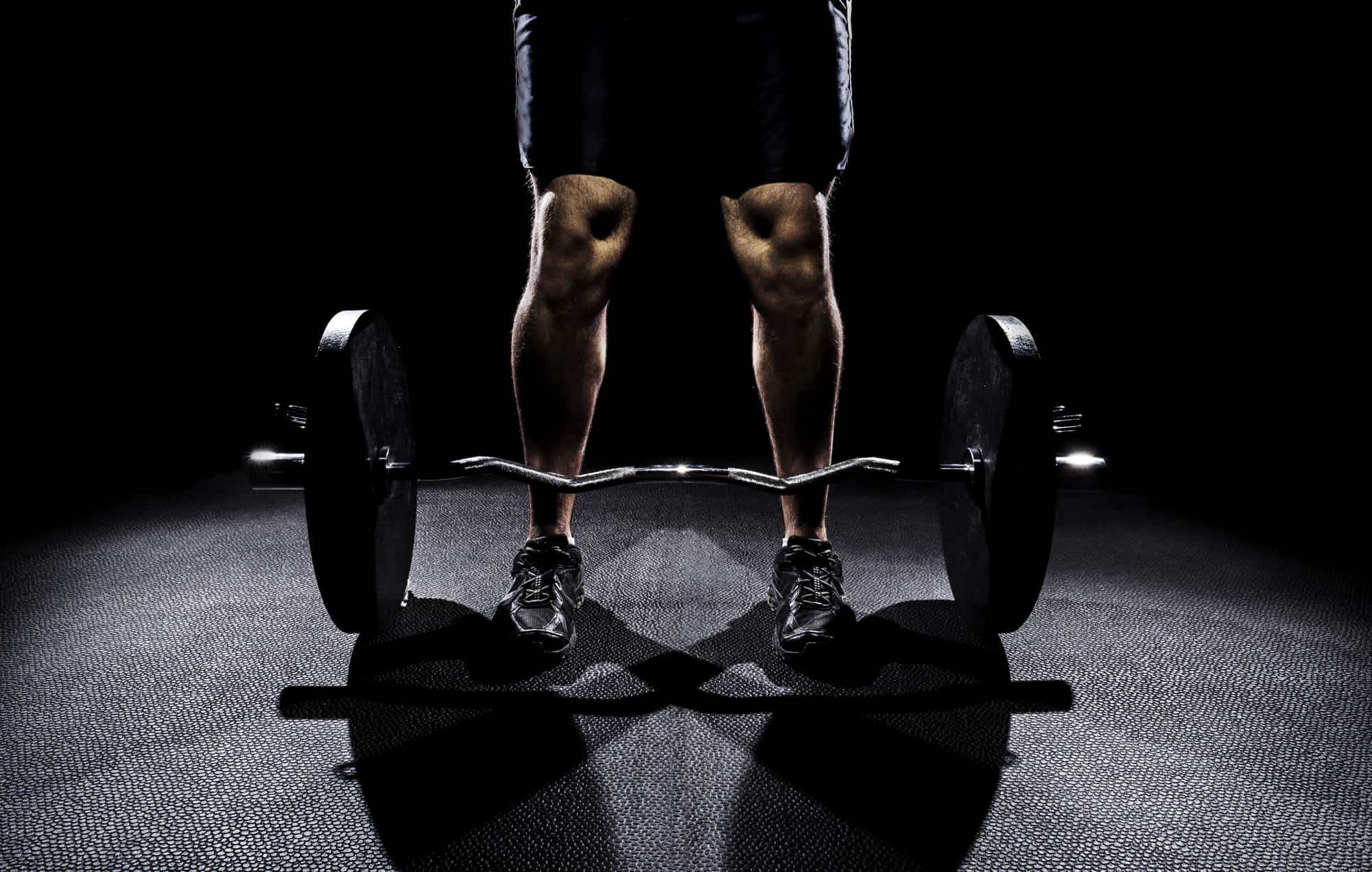 Strong person grasping weight