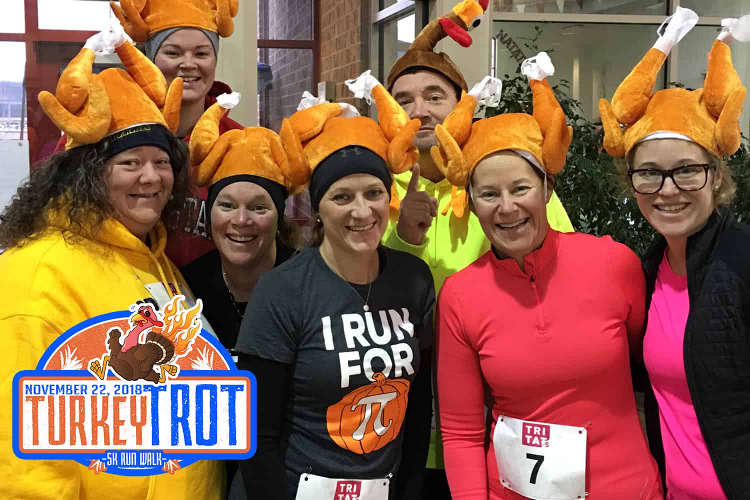 Turkey trot participants wearing turkey hats