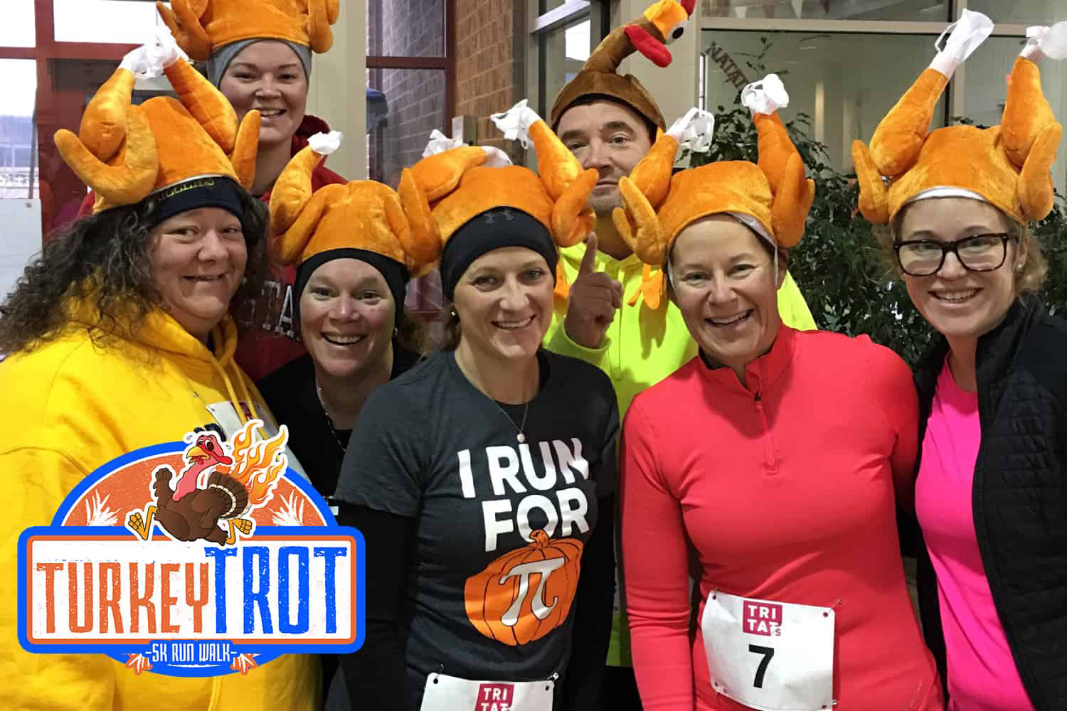 Turkey trot participants wearing turkey hats