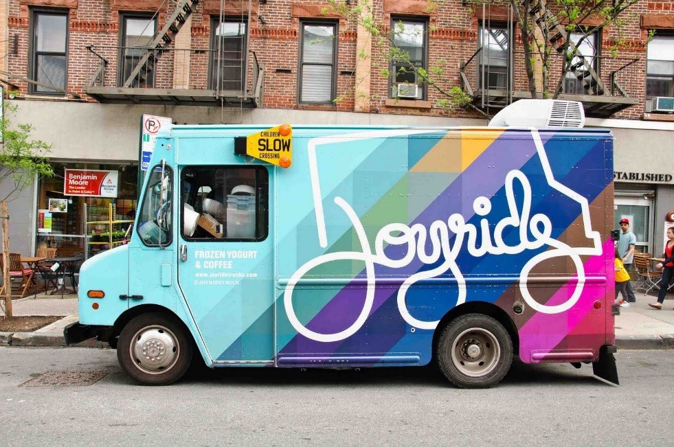 A van with graffiti on itDescription automatically generated with medium confidence