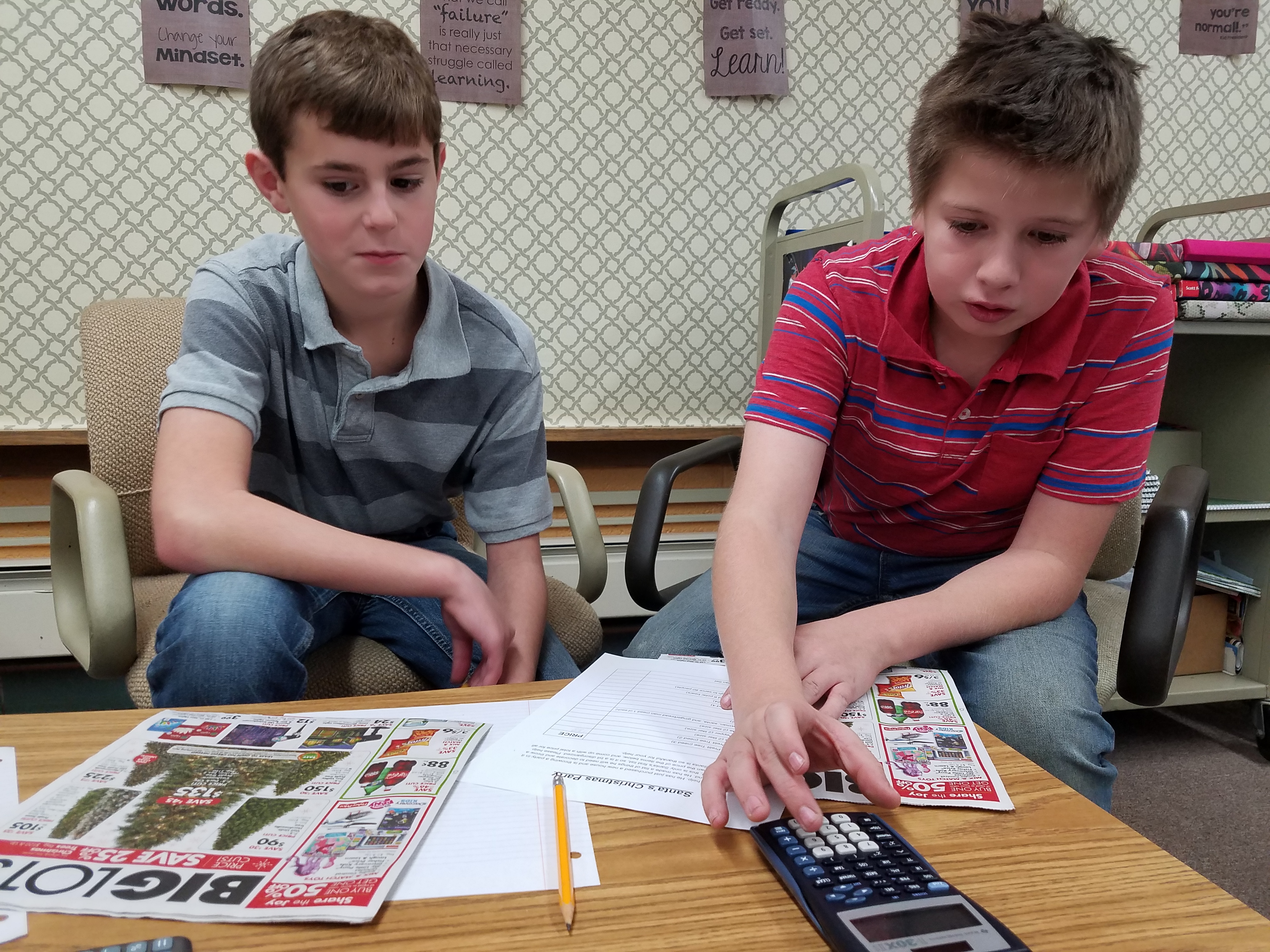 two boys doing math