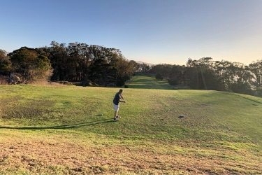 Man playing golf at Morro Bay Golf Course