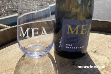MEA glass with a Chardonnay bottle