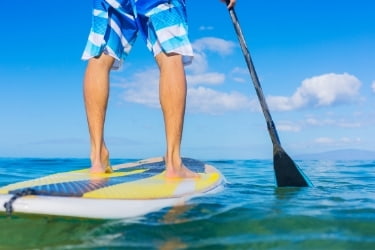 Man paddleboarding with a nice weather