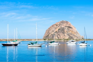 Morro Bay with fishing boats nearby