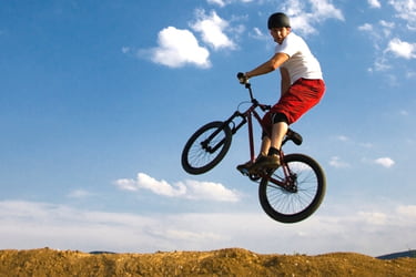 Man jumping with his bike