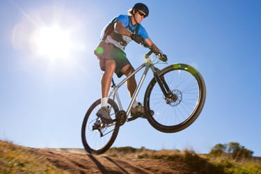Man riding down a dirt hill