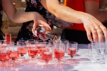 Cups of wine being served