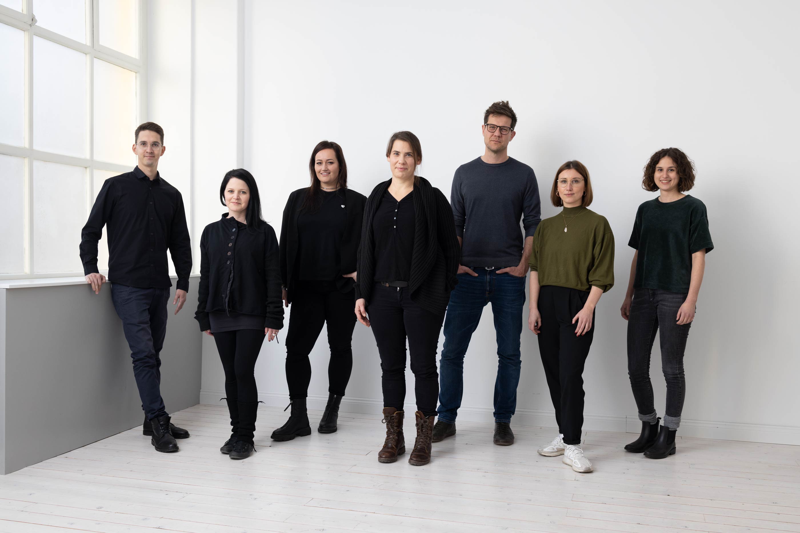 Teamfoto bemerkt mit Christopher Holtkotten im Vordergrund