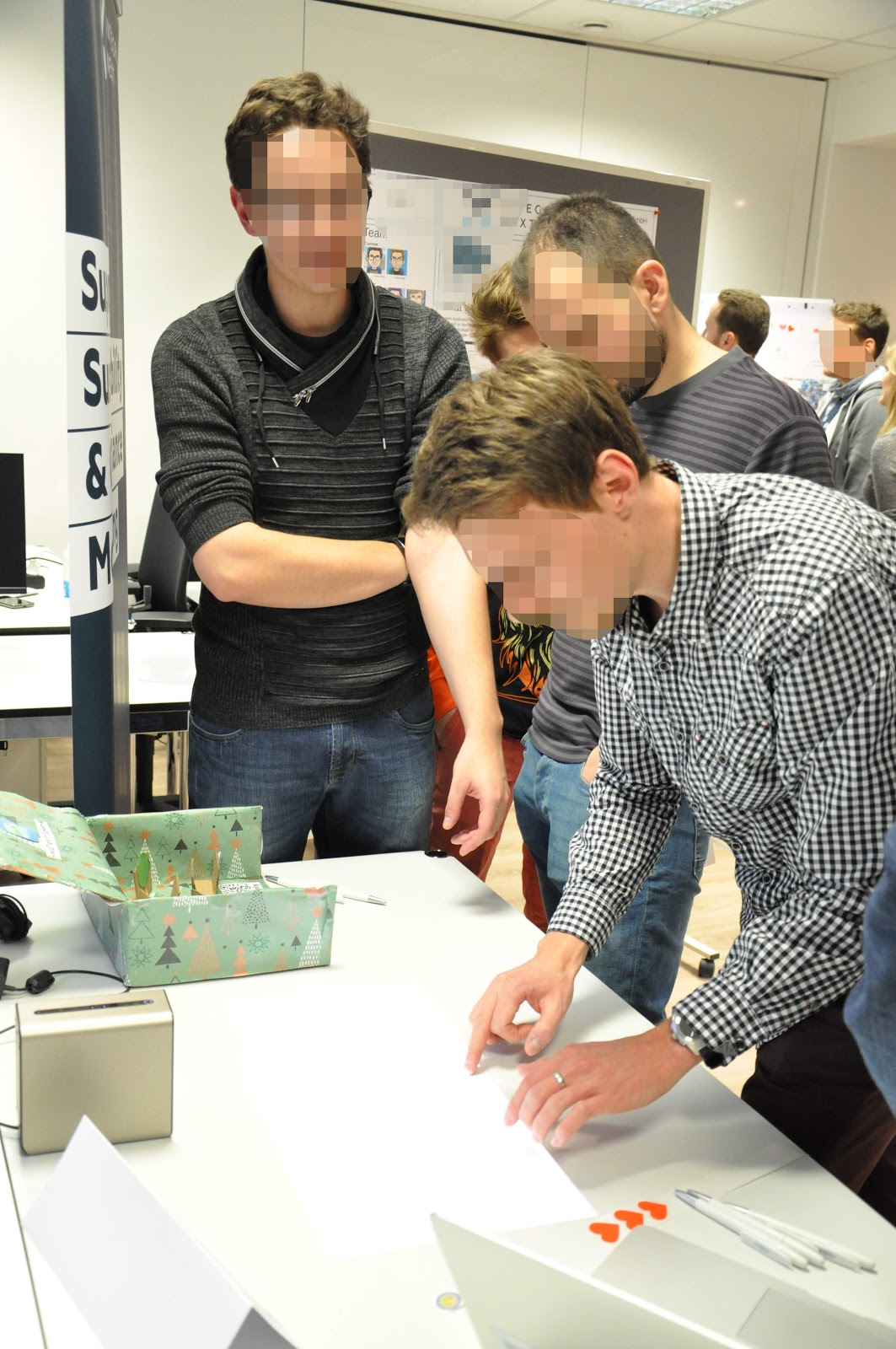 A colleague experiments and tests the application of another project