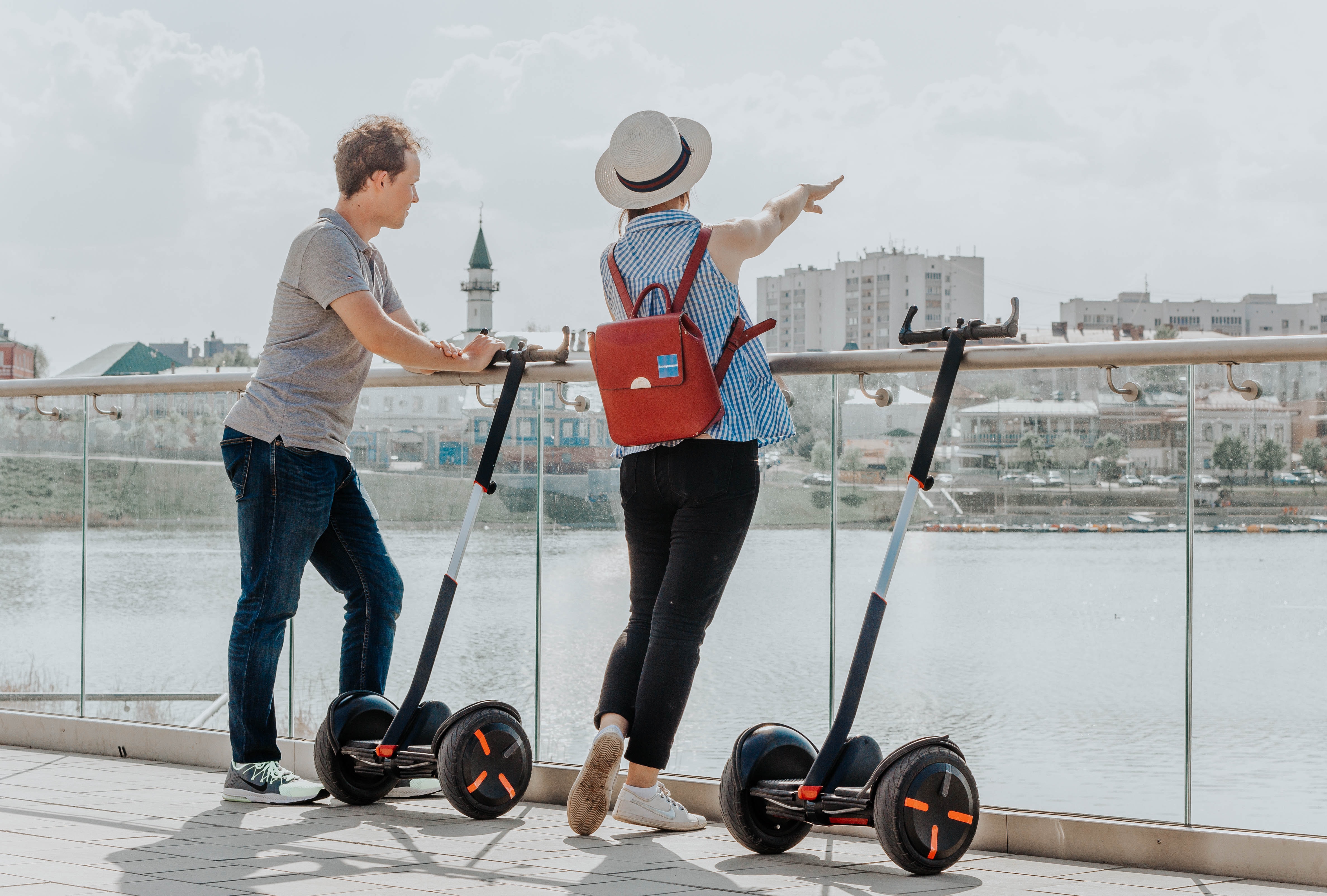 segway people stopped for a break river view