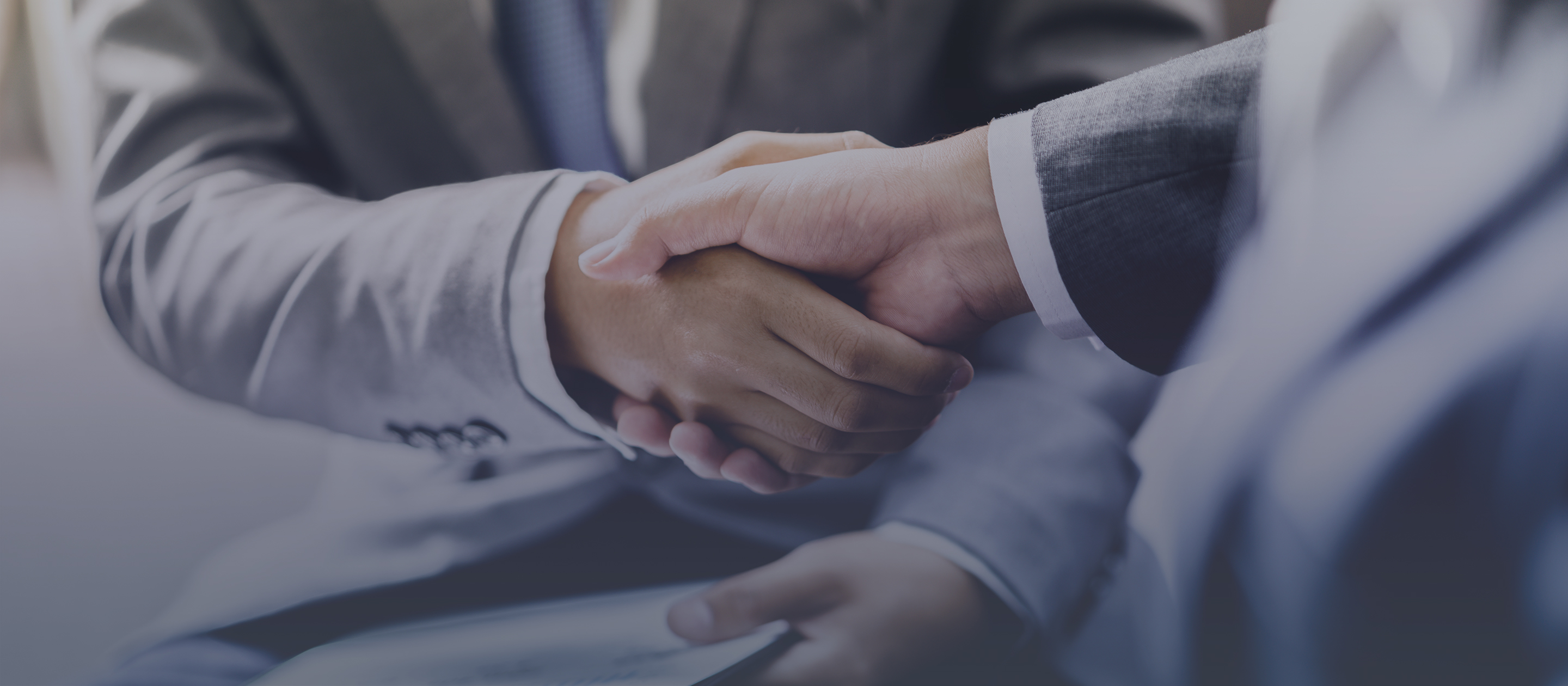 men in suits handshake
