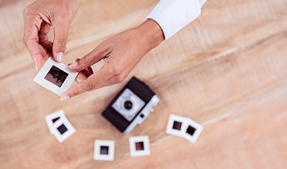 Picture of someone holding photo slides