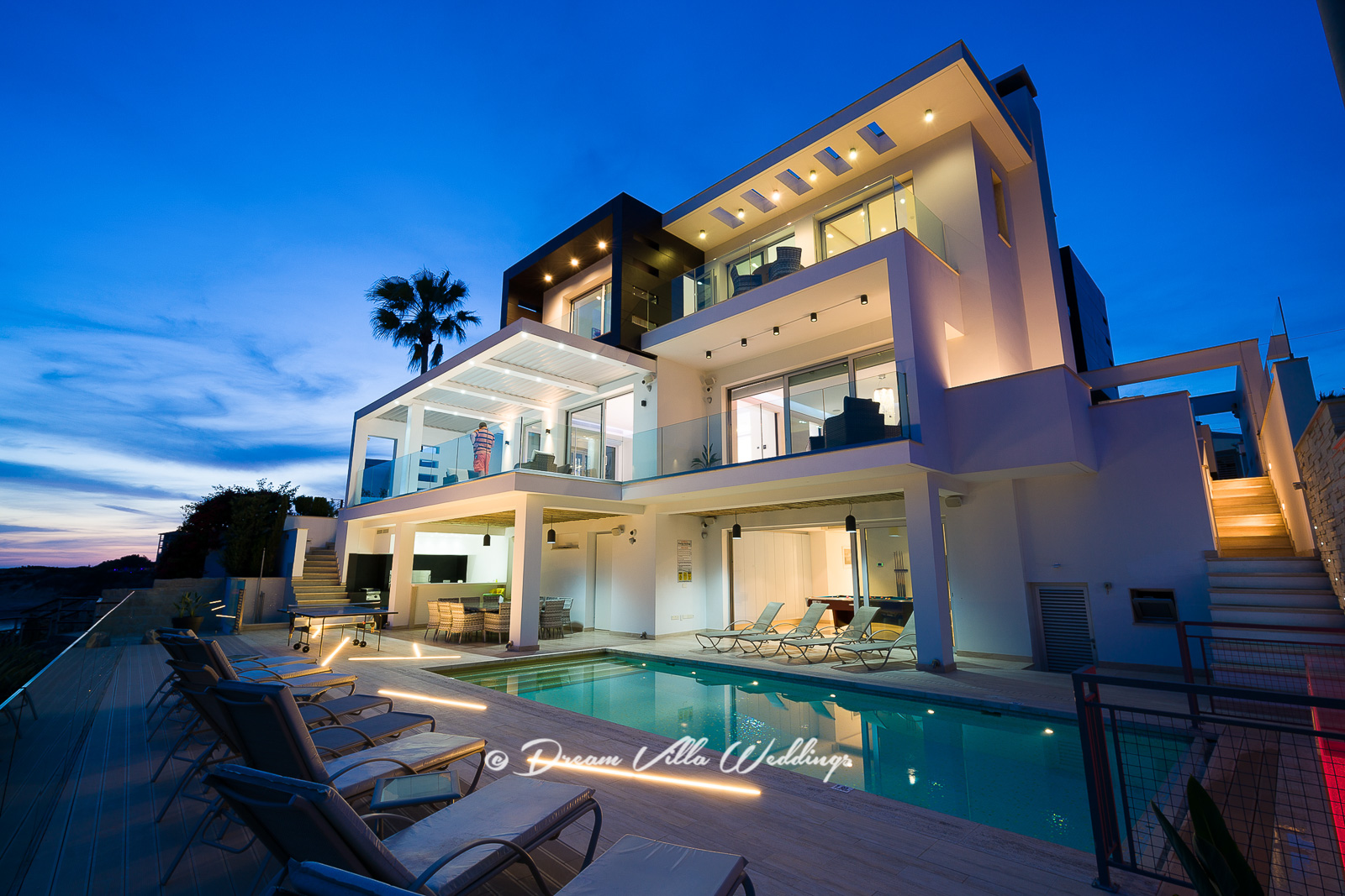 The villa lit-up at night