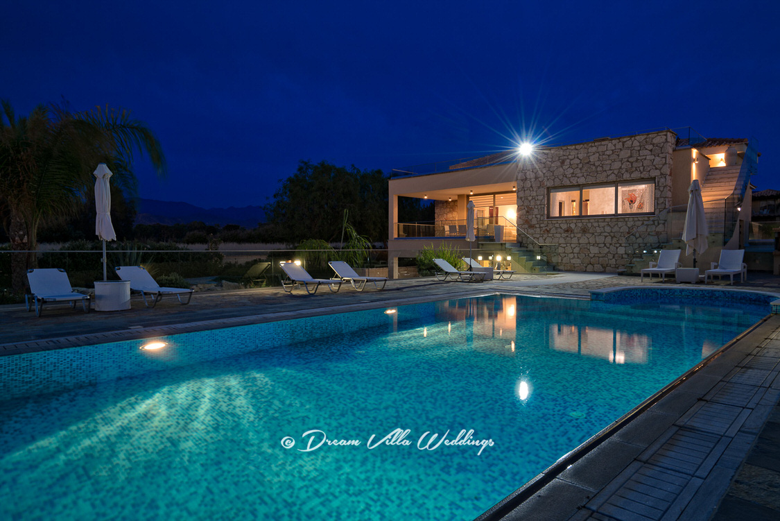 luxury wedding villa lit at night