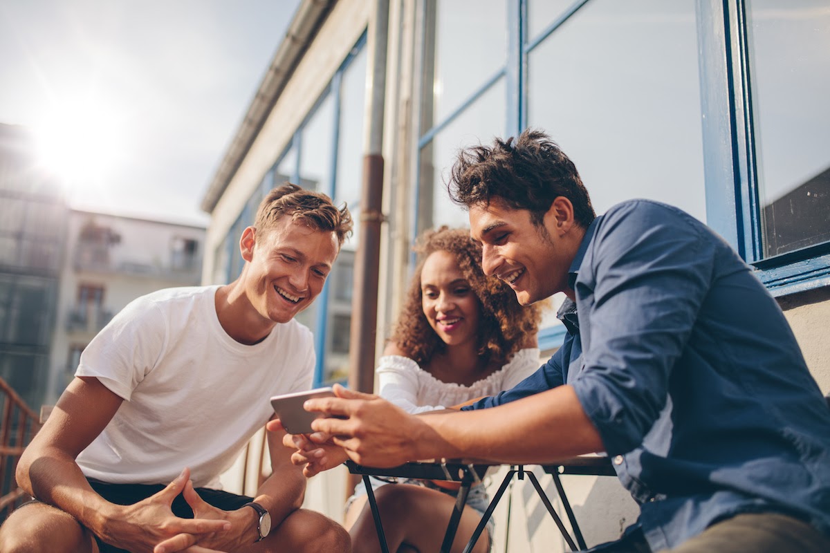 People looking at a phone