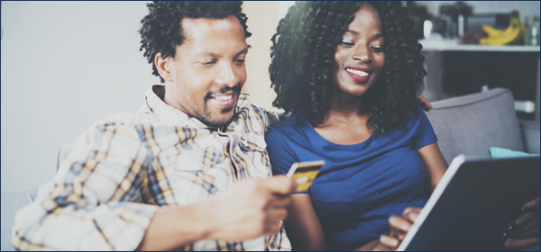 couple holding secured credit card