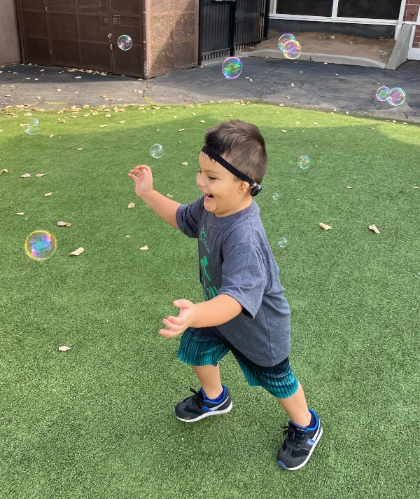 Strategies for Keeping Hearing Aids or Cochlear Implants on Young Children | CCHAT Center Sacramento
