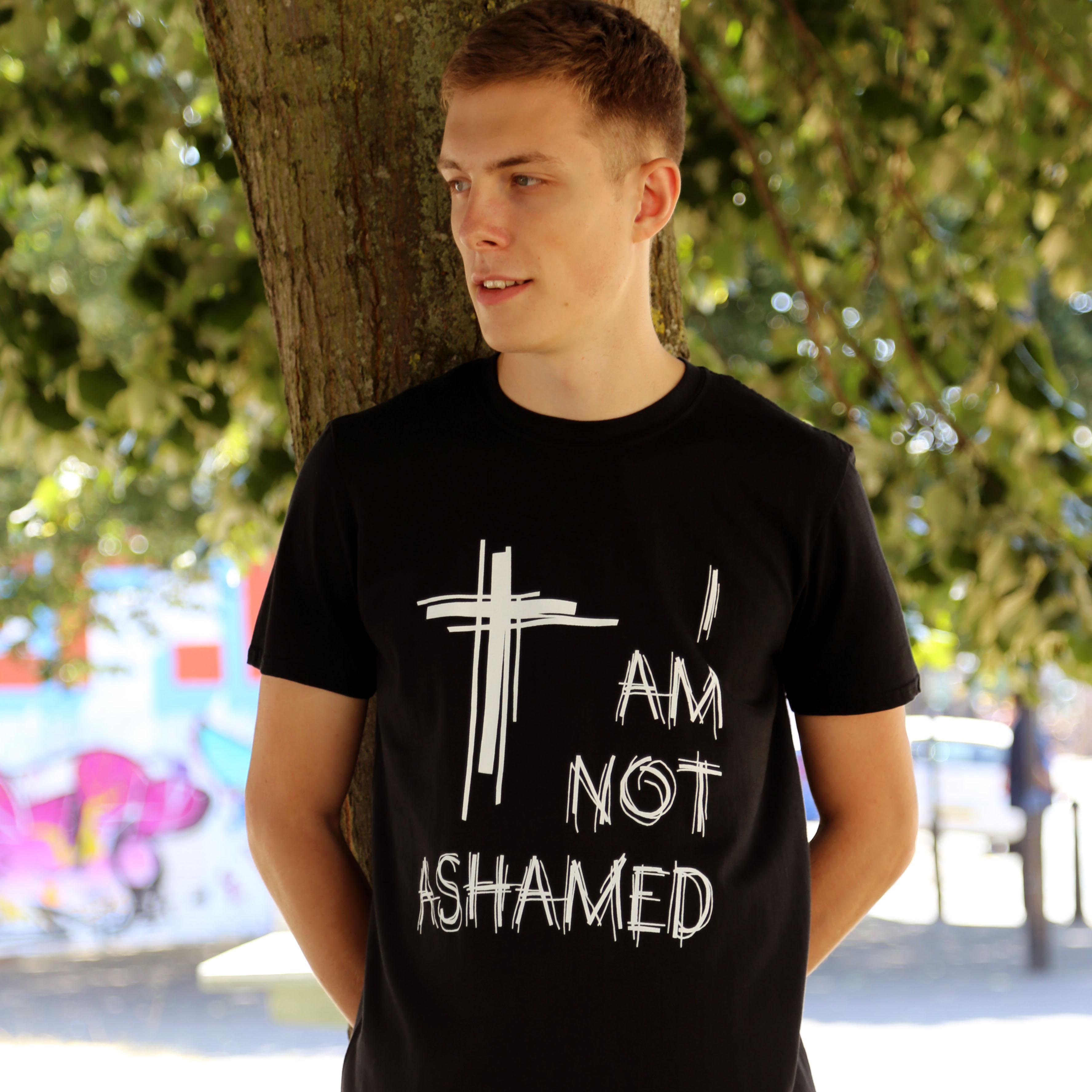 A picture of Joe wearing the 'I am not ashamed' t shirt.