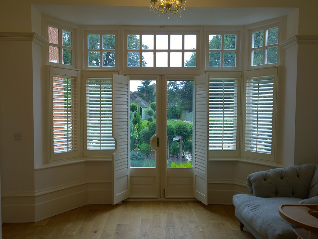Photo of French door cutout Plantation Shutters