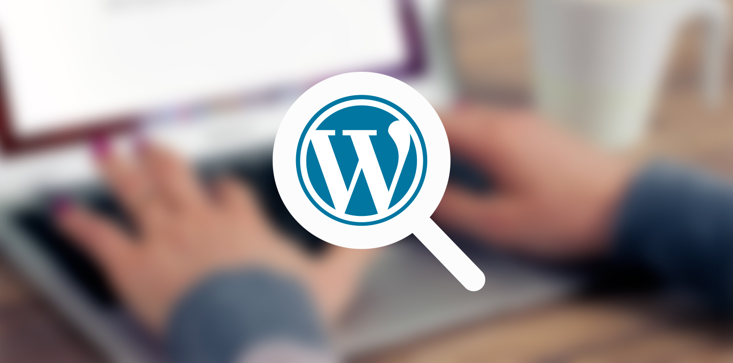 The wordPress logo with a blurred image behind