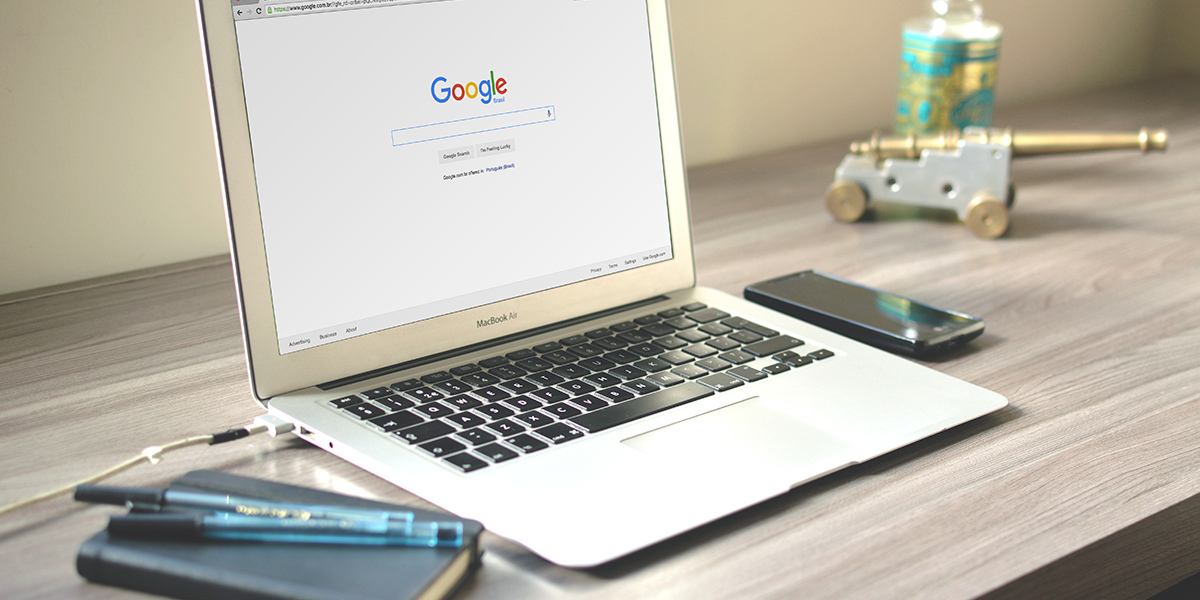 An open Laptop with the Google home page