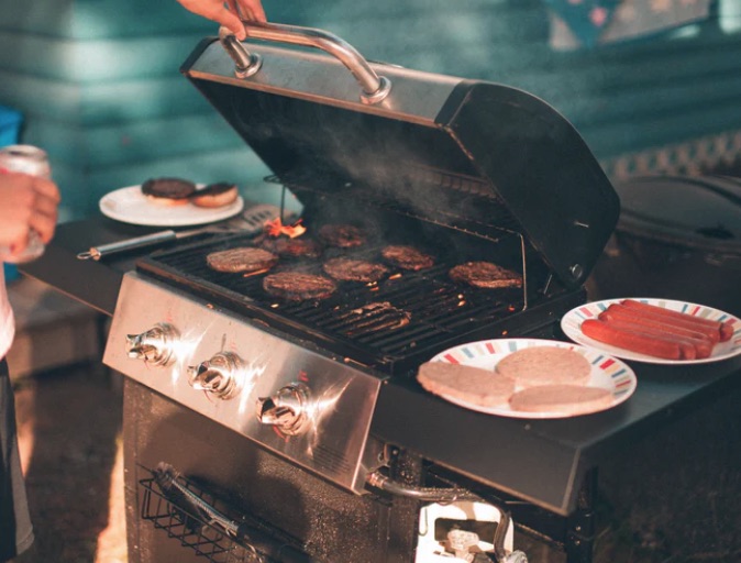 Barbecue grill cooking meat.
