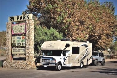 RV parked next to Boulder Creek sign