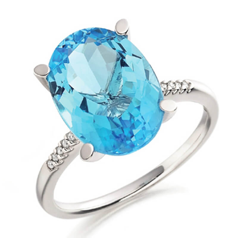 Blue Topaz and diamond ring in white gold