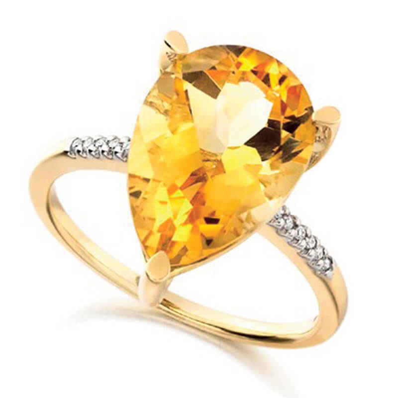 Citrind and diamond ring in yellow gold