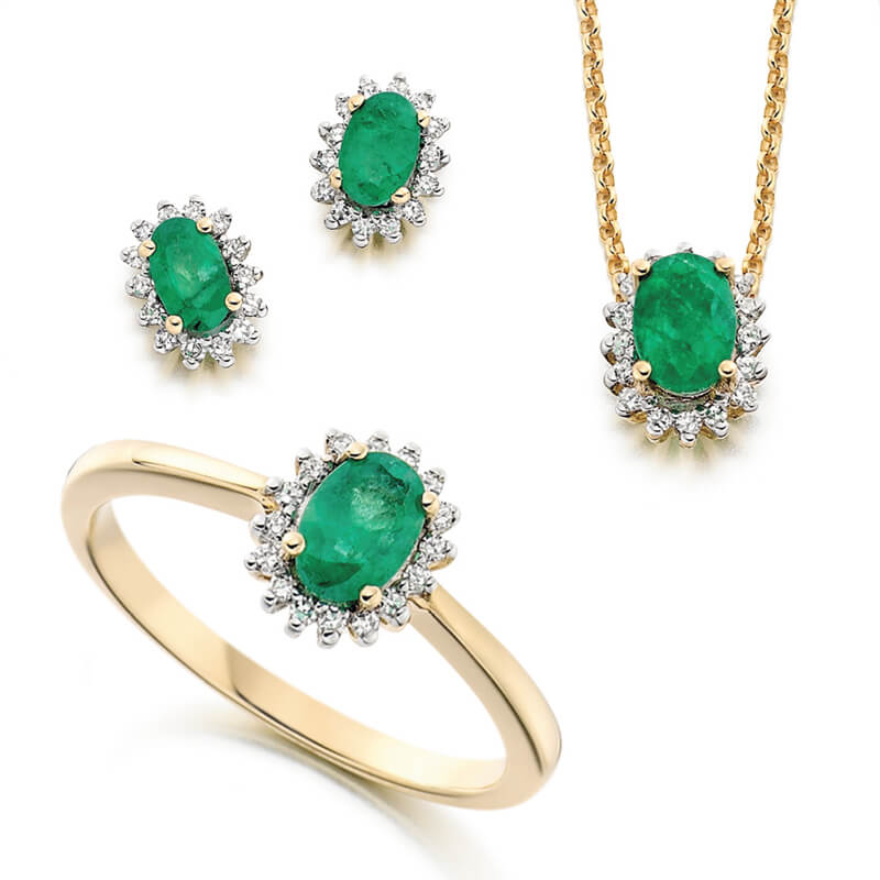 Jewellery suite of pendant, earrings and ring in yellow gold with gemstones