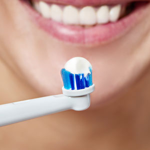 Toothpaste on electric toothbrush