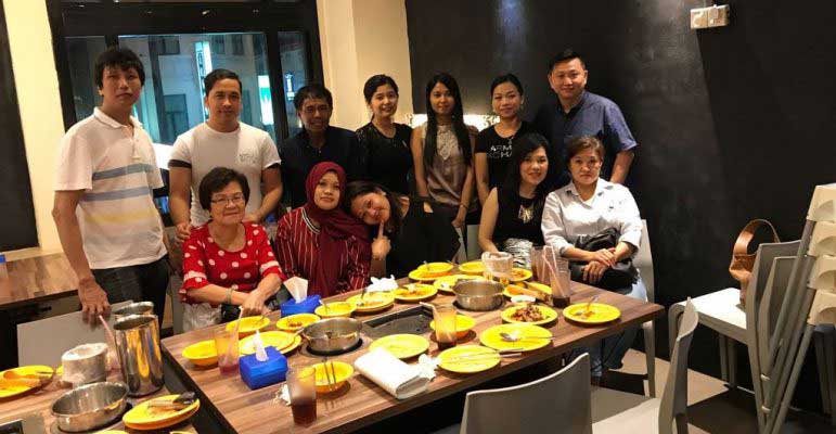 Nimbus celebrating an occasion with all their workers