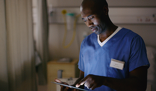 nurse using tablet
