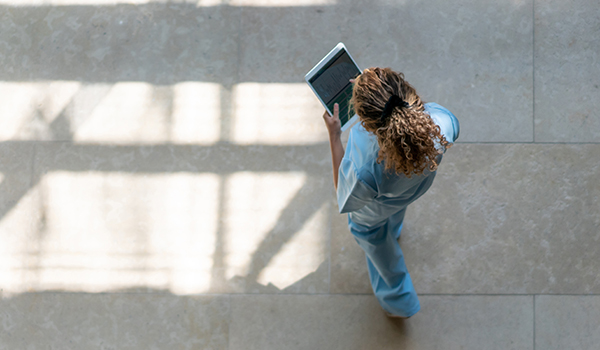 nurse viewing carerev on tablet