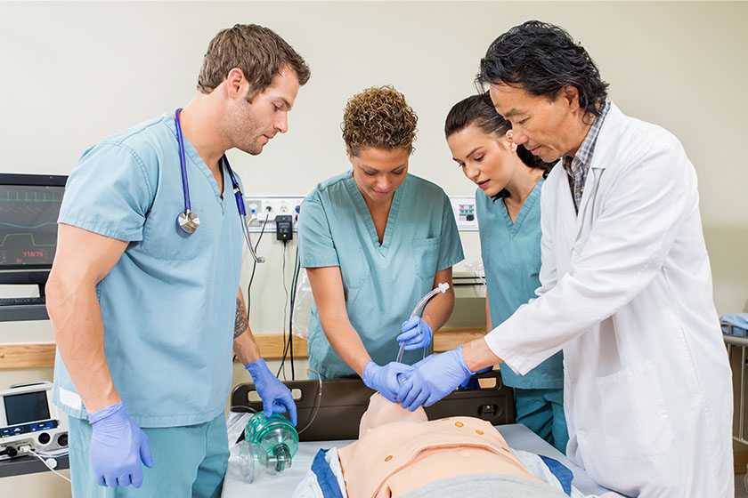 Group of CareRev nurses learning from a nurse educator